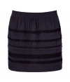 Adorable plum and black mini-skirt - Make a statement in this fun and flirty mini - Flattering shape and stylish piping details - Style with ribbed tights, a cashmere pullover, and knee-high boots for day - Pair with a tie-neck blouse, stockings, and wedge booties