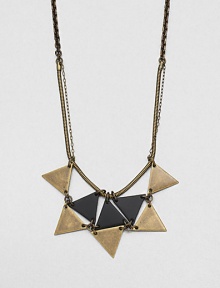 From the Facet Collection. An intriguing sunburst design is formed from antiqued and powder-coated brass triangles, hanging from snake and open link chains.BrassLength, about 28Lobster claspMade in USA From the Facet Collection. An intriguing sunburst design is formed from antiqued and powder-coated brass triangles, hanging from snake and open link chains.BrassLength, about 28Lobster claspMade in USA