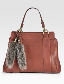 Smooth leather embossed with the Gucci logo, finished with antiqued goldtone hardware and a removable raccoon fur tail.Double top handles, 7½ drop Snap top closure Protective metal feet One center zip compartment Two inside open pockets Cotton linen lining 16¾W X 11¾H X 7D Genuine raccoon fur Made in Italy Fur origin: Canada DUE TO HIGH DEMAND, A CUSTOMER MAY ORDER NO MORE THAN 3 UNITS OF THIS ITEM EVERY THIRTY DAYS. Smooth leather embossed with the Gucci logo, finished with antiqued goldtone hardware and a removable raccoon fur tail.Double top handles, 7½ drop Snap top closure Protective metal feet One center zip compartment Two inside open pockets Cotton linen lining 16¾W X 11¾H X 7D Genuine raccoon fur Made in Italy Fur origin: Canada DUE TO HIGH DEMAND, A CUSTOMER MAY ORDER NO MORE THAN 3 UNITS OF THIS ITEM EVERY THIRTY DAYS.