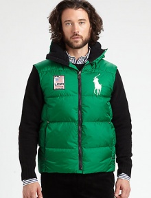 Crafted from durable ripstop nylon with a warm down fill and a removable hood, an essential cold-weather vest combines an airy feel with superior protection from the elements.Zip frontStand collarDetachable hoodZippered side pocketsAbout 27 from shoulder to hemFill: 80% down/20% other feathersNylonMachine washImported Crafted from durable ripstop nylon with a warm down fill and a removable hood, an essential cold-weather vest combines an airy feel with superior protection from the elements.Zip frontStand collarDetachable hoodZippered side pocketsAbout 27 from shoulder to hemFill: 80% down/20% other feathersNylonMachine washImported