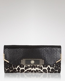 Snake leather and leopard prove a fierce combination on Sam Edelman's sleek clutch. Tuck the savage beauty under your arm with a colorful dress and head out for a wild night. Snake leather and leopard prove a fierce combination on Sam Edelman's sleek clutch. Tuck the savage beauty under your arm with a colorful dress and head out for a wild night.