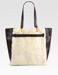 A beautifully tactile style in soft shearling and supple leather, perfect for all your daily essentials.Double shoulder straps, 10½ dropOpen topOne detachable zip pouchMetallic leather lining13W X 13½H X 5DMade in Italy A beautifully tactile style in soft shearling and supple leather, perfect for all your daily essentials.Double shoulder straps, 10½ dropOpen topOne detachable zip pouchMetallic leather lining13W X 13½H X 5DMade in Italy