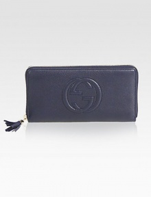 Soho leather zip-around wallet with inner pocketsLeatherLight fine gold hardwareZip-around closureEmbossed interlocking GTwelve card slots Three bill compartmentsZip coin pocket7.5W x 4.2H x .9DMade in Italy Soho leather zip-around wallet with inner pocketsLeatherLight fine gold hardwareZip-around closureEmbossed interlocking GTwelve card slots Three bill compartmentsZip coin pocket7.5W x 4.2H x .9DMade in Italy