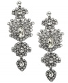 Glamour girl. The Givenchy name is known for its beauty and elegance, and these large-scale chandelier earrings are no exception. Wear them with your favorite evening ensemble for added sparkle. Made in hematite tone mixed metal, they're embellished with glittering glass accents and crystals. Approximate drop: 3-3/8 inches.