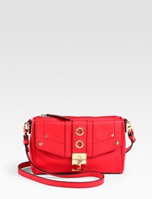 This slim leather design in a smart and sophisticated crossbody style is perfect for your essentials.Detachable shoulder strap, 24 dropTop zip closureOne outside flap pocketOne inside zip pocketSatin lining10W X 6½H X 2½DImported