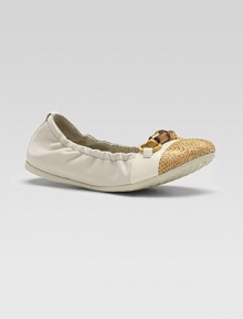 A toe of natural woven straw refreshes a classic ballerina flat of smooth and patent leather, with a signature horsebit adornment.Smooth and patent leather upperElasticized sides and backBamboo horsebit with golden hardwareRubber soleMade in Italy A toe of natural woven straw refreshes a classic ballerina flat of smooth and patent leather, with a signature horsebit adornment.Smooth and patent leather upperElasticized sides and backBamboo horsebit with golden hardwareRubber soleMade in Italy