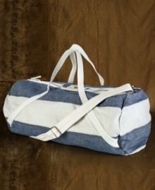 Made to take you from the city to the country and back, a durable weekend duffle in raw chambray denim and canvas is roomy enough to store all of your essentials in effortless, rugged style.