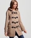 Show off iconic style in this chic Burberry Brit coat that boasts timeless details. Cozy yet sleek, this coat takes you from work to weekend in style.