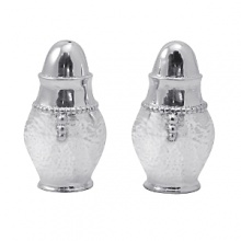 Shaped by hand of durable recycled aluminum, this striking salt-and-pepper set from Mariposa is detailed with a softly textured finish and beaded edges for a look that's at once organic and refined. Shaped by hand of durable recycled aluminum, this striking salt-and-pepper set from Mariposa is detailed with a softly textured finish and beaded edges for a look that's at once organic and refined.
