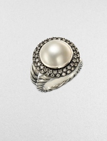 From the Moonlight Ice Collection. A stunning mabe pearl sits center of two rows of sparkling diamonds in blackened sterling silver. White cultured freshwater mabe pearlDiamonds, .75 tcwBlackened sterling silverWidth, about ½Imported