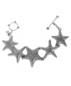 Lucky Brand's Starfish bracelet lets you take a bit of sea with you, no matter where you go. Crafted in silver tone mixed metal with a toggle clasp closure. Approximate length: 7-5/8 inches.