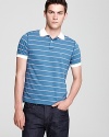 This Is Not A Polo Shirt By Band of Outsiders Polo pushes the envelope with this deft and ironic stripe design, featuring inside out details like exposed seams and a stitched pocket for a unique take on contemporary fashion.