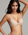 A smooth underwire cup bra with floral lace embellishments along straps and wings. Style #55362