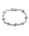 Glittering and glamorous! Crafted in silver tone mixed metal and surrounded by sparkling crystals, Givenchy's flex bracelet will have an eye-catching effect on even the most casual ensemble. Approximate length: 7-1/2 inches.