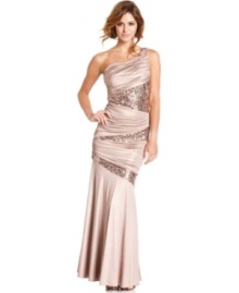 Turn heads in this mermaid-style gown from Speechless! Featuring alternating panels of sequins and a stately silhouette, this one-shoulder dress is all about grand, red carpet style. Turn heads in this mermaid-style gown from Speechless! Featuring alternating panels of sequins and a stately silhouette, this one-shoulder dress is all about grand, red carpet style.