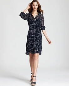 Energize your daytime look with a DKNYC dress, scattered with playful polka dots for a distinctly retro look. Simply secure the roll-tab sleeves as the weather warms for season-spanning style.