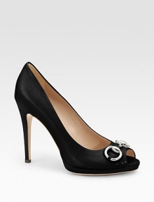 Sophisticated peep-toe classic, with silvertone horsebit, impeccably crafted in Italian leather.Self-covered heel, 4½ (115mm) Self-covered platform, ¾ (20mm) Compares to a 3¾ heel (95mm) Leather lining and sole Padded insole Made in ItalyOUR FIT MODEL RECOMMENDS ordering true size. 