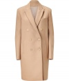 Refine your outerwear essentials with No.21s exquisitely chic camel coat, styled in a super soft mix of wool-cashmere for elegant results tailored to multi-season sophistication - Peaked lapel, long sleeves, double-breasted buttoned front, side slit pockets, slim straight silhouette - The perfect finish to sharply cut separates