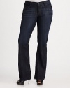 This flattering high-waist bootcut fit features soft distressing for a modern look.THE FITFitted through hips and thighs High-rise Inseam, about 34THE DETAILSZip fly with button closure Five-pocket style 70% cotton/27% polyester/3% Lycra spandex Machine wash Made in the USA of imported fabric