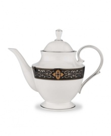 The Vintage Jewel pattern from Lenox's dinnerware and dishes collection evokes a more gracious era, combining white bone china with a dark, richly patterned band accented with subtle touches of cobalt blue. The Vintage Jewel pattern from Lenox's dinnerware and dishes collection evokes a more gracious era, combining white bone china with a dark, richly patterned band accented with subtle touches of cobalt blue.