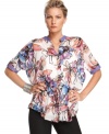 Mixed prints give this petite blouse from Calvin Klein a fashion-forward twist, while the sheer, floral patterned silhouette is spot-on for spring. (Clearance)