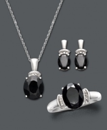 Black onyx makes a statement of bold sophistication. This classic jewelry set features oval-cut faceted onyx (7-5/8 mm) with sparkling diamond accents at the crown. Set includes: stud earrings, pendant, and ring. Crafted in sterling silver. Approximate necklace length: 18 inches. Approximate necklace drop: 3/4 inch. Approximate earring diameter: 3/4 inch. Ring size 7. Black onyx makes a statement of bold sophistication. This classic jewelry set features oval-cut faceted onyx (7-5/8 mm) with sparkling diamond accents at the crown. Set includes: stud earrings, pendant, and ring. Crafted in sterling silver. Approximate necklace length: 18 inches. Approximate necklace drop: 3/4 inch. Approximate earring diameter: 3/4 inch. Ring size 7.