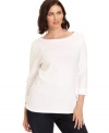 Stock up on casual basics with Karen Scott's plus size three-quarter-sleeve plus size top-- grab one in every color!