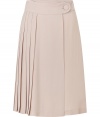 Feminine and flirty, this lovely blush-hued pleated skirt from Tara Jarmon is a chic must-have - Wide waistband with button-tab, full skirt with asymmetric pleating - Pair with a tie-neck blouse and heels