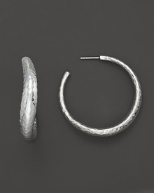 Subtly textured sterling silver hoops in an undulating silhouette. By Ippolita. Subtly textured sterling silver hoops in an undulating silhouette. By Ippolita.