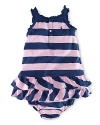 Sure to be a summer essential, an airy cotton jersey dress is crafted in a bold, striped pattern and finished with a flurry of ruffles.