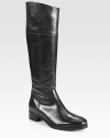 Asymmetrical equestrian-inspired tall silhouette, rendered in ultra-smooth leather with an easy back zip. Stacked heel, 1½ (40mm)Shaft, 17Leg circumference, 14Leather upperBack zipLeather liningRubber and leather solePadded insoleMade in Italy