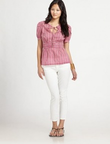 This feminine, prettily ruched style is printed with a cheerful signature pattern.Vented jewel neckline with drawstring self tieShort puffed sleeves with button cuffsRuched waistbandConcealed side zipAbout 22¼ from shoulder to hemCottonDry cleanImportedModel shown is 5'10 (177cm) wearing US size 4. This feminine, prettily ruched style is printed with a cheerful signature pattern.Vented jewel neckline with drawstring self tieShort puffed sleeves with button cuffsRuched waistbandConcealed side zipAbout 22¼ from shoulder to hemCottonDry cleanImportedModel shown is 5'10 (177cm) wearing US size 4.