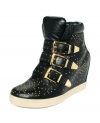 Jazz up your day with the small all-over studs on STEVEN by Steve Madden's Jackle wedge sneakers. A trio of buckled straps stretches across the vamp, while a light rubber sole provides an excellent contrast.