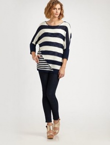 Boldly striped boatneck with long dolman sleeves, ribbed details and deconstructed, asymmetrical seaming. BoatneckLong dolman sleevesRibbed cuffs and hemLonger length hits below the hips58% linen/31% acrylic/11% nylonDry cleanImportedModel shown is 5'9½ (176cm) wearing US size 4.