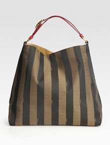 Tailored stripes define this slouchy carryall crafted in sturdy poly-cotton, finished with an adjustable leather strap.Adjustable leather shoulder strap, 5½-6 drop Magnetic snap closure One inside zip pocket Linen lining 15W X 14H X 7D 70% polyester/20% cotton/10% polyurethane Imported