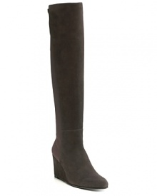 Soft, stretchy suede flatters endlessly--and lengthens legs. Pair Stuart Weitzman's long, lean boots with bodycon dresses.