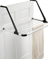 Open the door to space solutions! Do even more in your home with this over-the-door polished stainless steel laundry rack, which creates room for drying delicate clothes and keeps clutter to a minimum by cleverly folding up when not in use. Adjustable arms makes this the perfect companion for doors of all sizes! 10-year warranty.