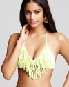 There's something fashion-forward about L*Space's fringed bikini. Hinting at flirtatious but wholly feminine, this daring suit is destined to stun when you shimmy in the sun.