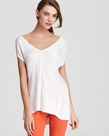 Cut in a flowing silhouette, this Vince top is uniquely cool--designed with double v-shaped necklines for a modern take on the classic style. Cut in a flowing silhouette, this Vince top is uniquely cool--designed with double v-shaped necklines for a modern take on the classic style.