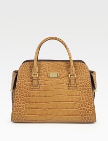 A lady-like, top-handle shape crafted of embossed crocodile for an extra dose of luxe. Double top handles, 3¾ dropTop zip closureTwo outside open pocketsProtective metal feetOne inside zip pocketTwo inside open pocketsLeather lining13½W X 10H X 6½DImported A lady-like, top-handle shape crafted of embossed crocodile for an extra dose of luxe. Double top handles, 3¾ dropTop zip closureTwo outside open pocketsProtective metal feetOne inside zip pocketTwo inside open pocketsLeather lining13½W X 10H X 6½DImported