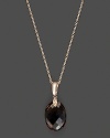 Diamonds accent a faceted smoky quartz, set in 14K rose gold.