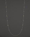 Bezel set diamonds and peridot stones in a sterling silver chain. From Ippolita.