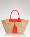 Summon sun and sand with MARC BY MARC JACOBS' leather and straw tote. The textured carryall holds beach essentials and looks prime with bright bikinis.