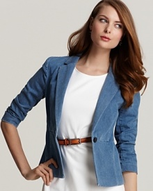 Layer your day with the cool style of this Theory denim blazer, adding modern edge to the most polished of looks. The epitome of work-to-weekend chic, it executes the season's downtown trend with fashion authority.