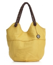 The Sak contrasts the rich leather body on their hold-it-all Indio Leather tote with tactile, woven handles. The Sak contrasts the rich leather body on their hold-it-all Indio Leather tote with tactile, woven handles.