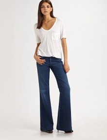 This season's must-have wide-leg silhouette, crafted from gently faded stretch denim.THE FITFitted through hips and thighsRise, about 9½Inseam, about 36THE DETAILSZip flyFive-pocket style68% cotton/30% cupro/2% polyurethaneMachine washMade in USA of imported fabricModel shown is 5'9 (175cm) wearing US size 4.