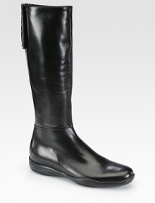 A signature logo detail and easy zip closure backs this traditional leather boot. Rubber heel, 1 (25mm)Shaft, 15Leg circumference, 13½Leather upperBack zip and velcro closureLeather liningRubber solePadded insoleMade in ItalyOUR FIT MODEL RECOMMENDS ordering one size up as this style runs small. 