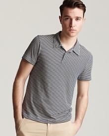 Under a blazer or featured with chinos, this striped slim fit polo adds trans-Atlantic chic to your casual look. Under a blazer or featured with chinos, this striped slim fit polo adds trans-Atlantic chic to your casual look.