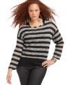 Score the look of layers all in one style with ING's long sleeve plus size top, including a striped shell and tank inset. (Clearance)