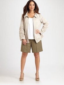 Especially feminine, this lightweight jacket is finished with a ruffled collar.Ruched long sleevesFront zipperDrawstring waist and hemAbout 28 from shoulder to hem80% polyester/20% nylonDry cleanImported